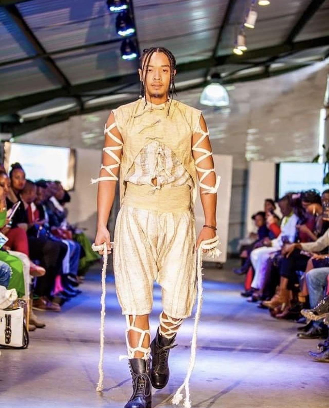 Bobbin Case editorial — model in hand-painted sisal sack dress, Uganda